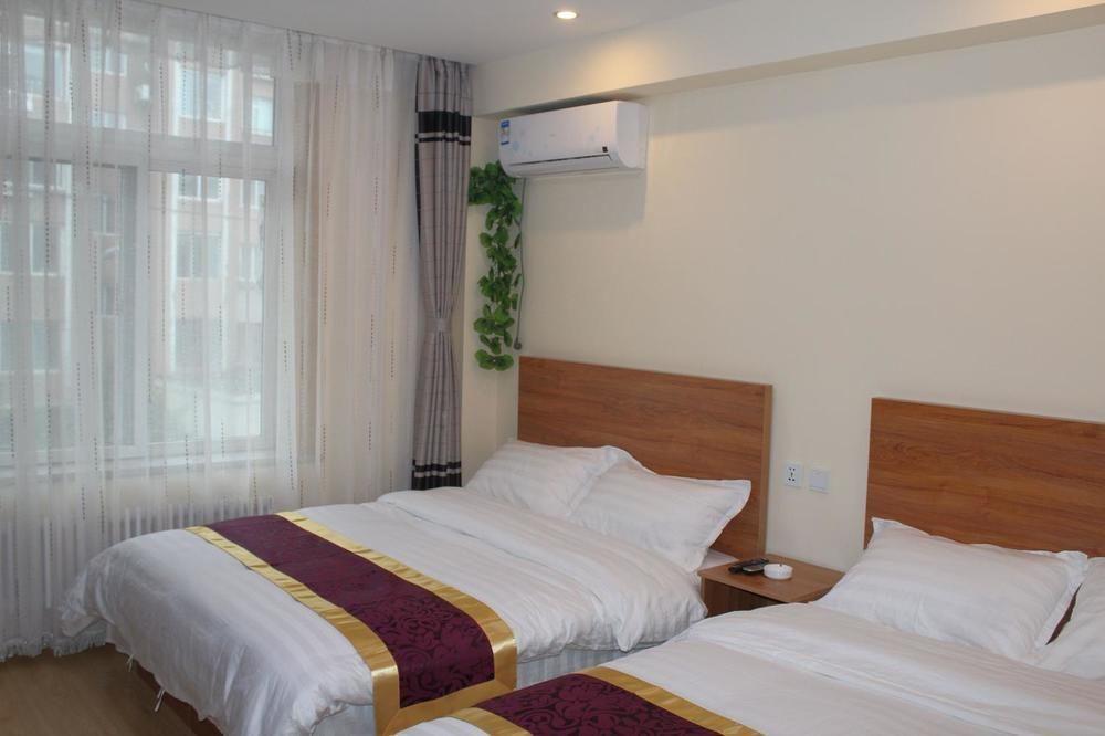 Dalian Kai Bin Business Inn Exteriör bild